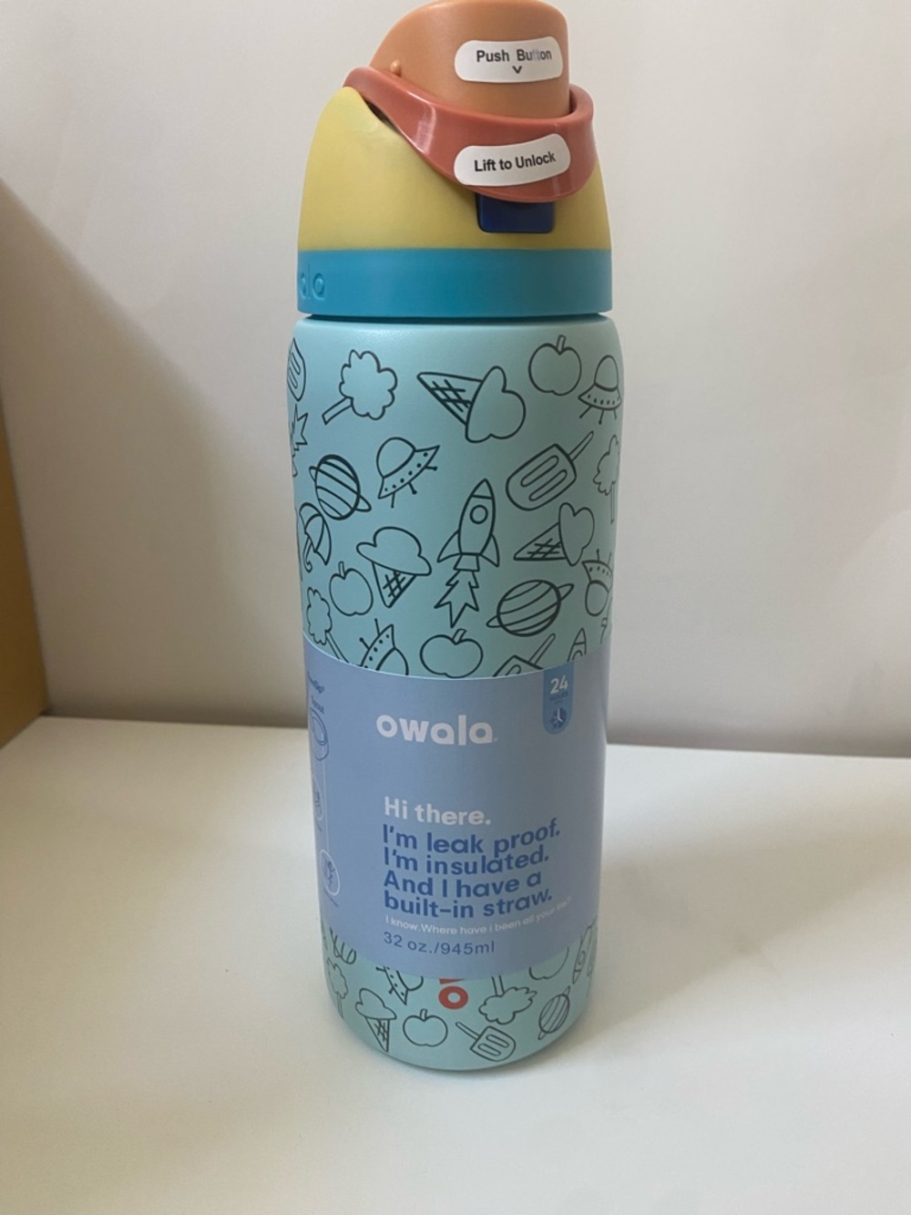 Owala FreeSip Insulated Water Bottle - Light Blue with Yellow & Coral Top